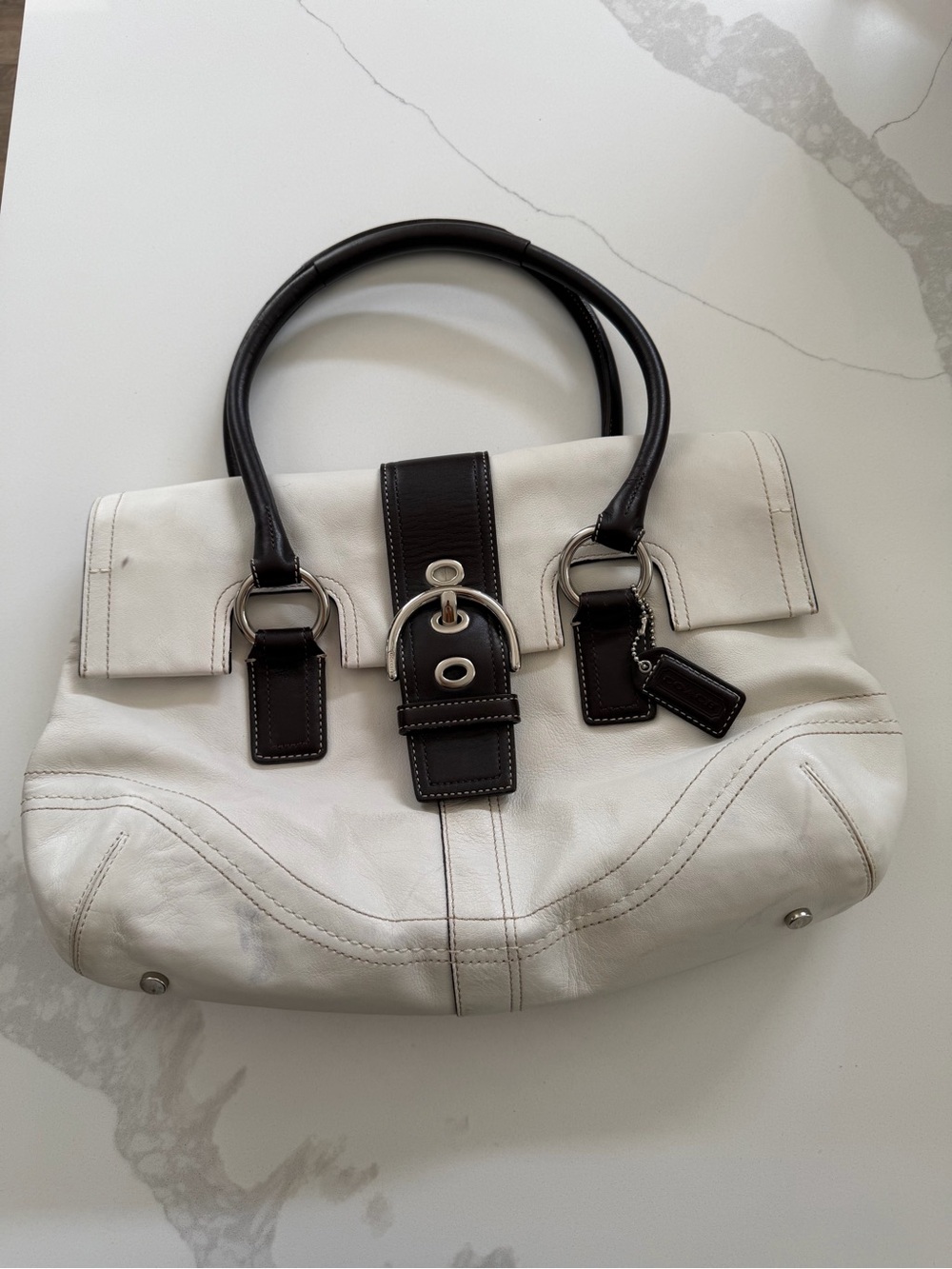 vintage Coach Hamptons Soho Buckle Satchel featuring a distinctive dark brown